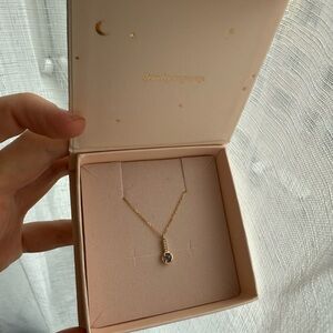 Elegant Gold Necklace with Blue Gemstone